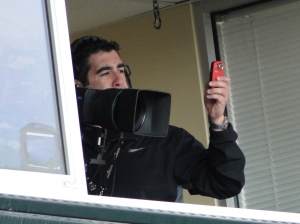 AT&T Park.  Cameraman and his Cell Phone.